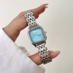 ساعت DW زنانه بند حصیری صفحه مربع آبی فیروزه ای