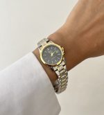 ساعت کاسیو زنانه تقویم دارصفحه مشکی بند سیلور طلایی - Image 4