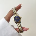 ساعت کاسیو زنانه تقویم دار صفحه سورمه ای بند سیلور طلایی