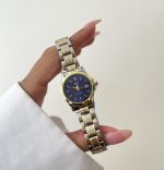 ساعت کاسیو زنانه تقویم دار صفحه سورمه ای بند سیلور طلایی