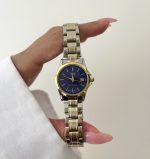 ساعت کاسیو زنانه تقویم دار صفحه سورمه ای بند سیلور طلایی - Image 2