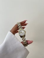 ساعت کاسیو زنانه تقویم دار صفحه سفید بند سیلور طلایی - Image 4