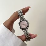 ساعت نایدو صفحه مربع صورتی بند حصیری