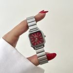 ساعت DW صفحه زرشکی بند سیلور کرکره ای